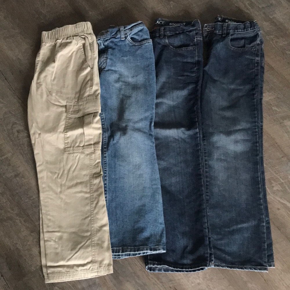 Four pairs boys pants. size 10 husky. Great condition